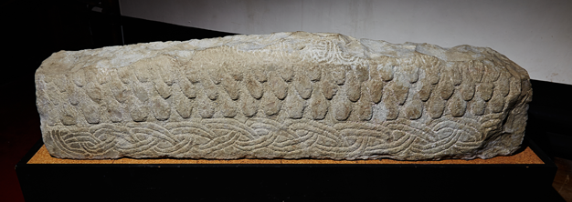 The carved Viking-age hogback stone associated with St Bridget's Church