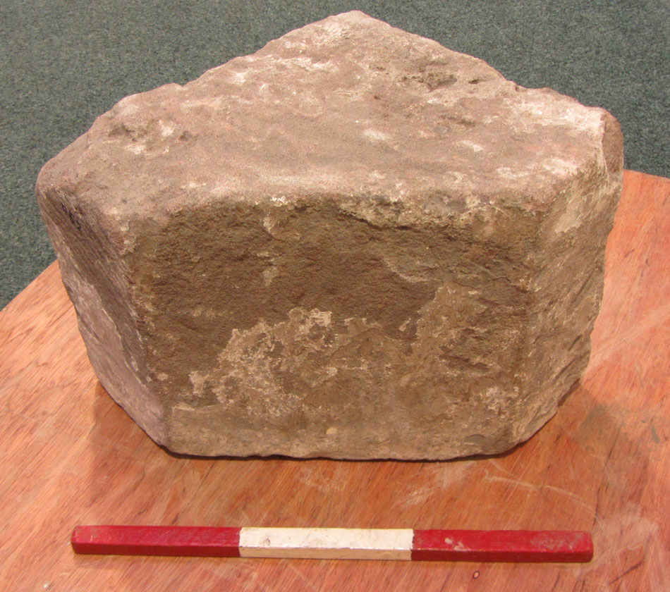 Triangular piece of structural stone, date unknown, accession CDBM 052